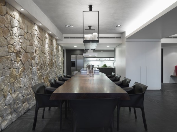 Modern dining room with long wooden table