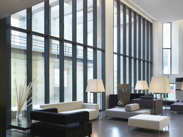 Sitting area with high ceilings and modern furniture
