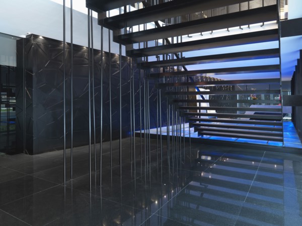 View from beneath modern staircase