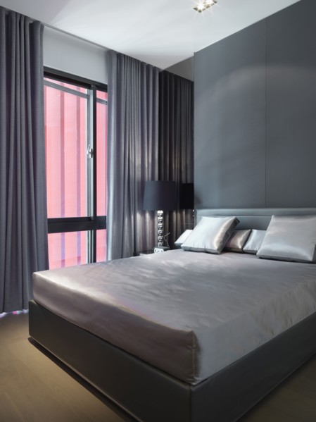 Simple bed with satin sheets