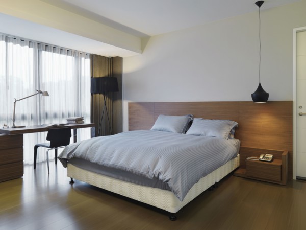 Small modern bedroom with desk