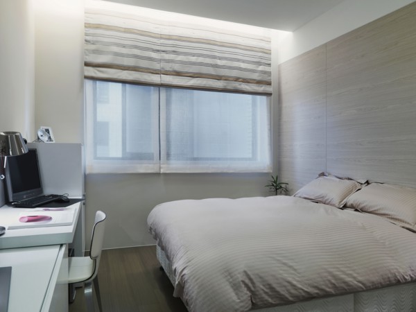 Small modern bedroom with desk