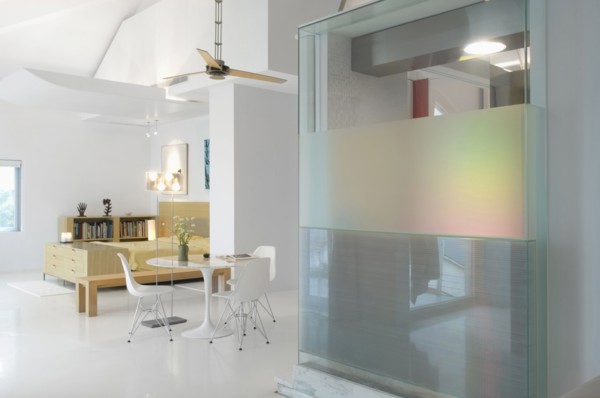 Dining table in center of modern interior