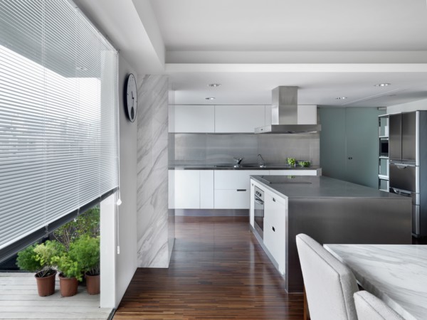 Modern Kitchen and dining room with stainless steel kitchen island