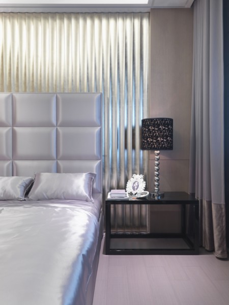 Satin bed with elegant headboard