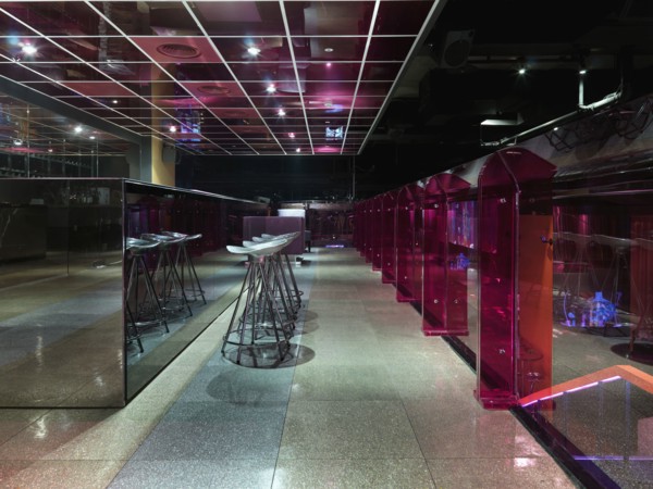 Bar counter and stools in modern nightclub