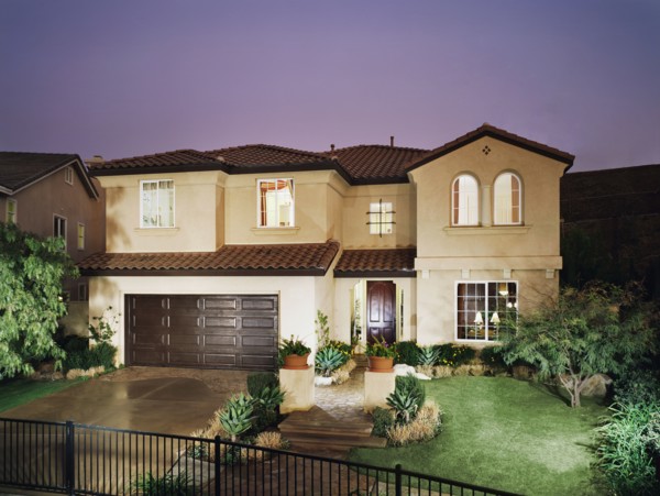 Front exterior multiple story spanish style home