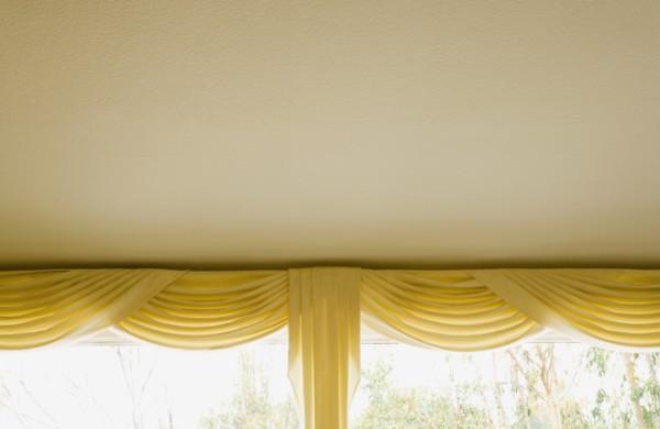 Yellow Valance and Curtains on Window