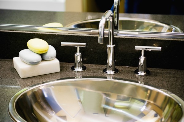 Detail of Metal Bathroom Sink and Faucet