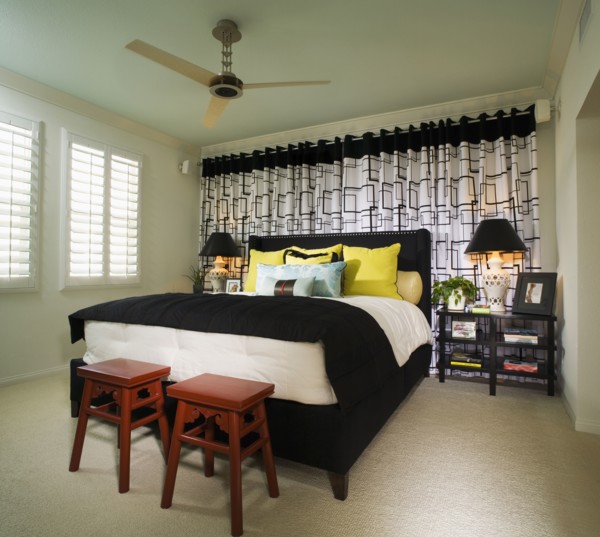 Brightly Colored Bedroom with Red Stools