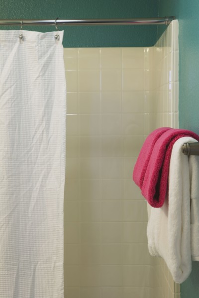 Contemporary Teal Bathroom with White Shower and Shower Curtain