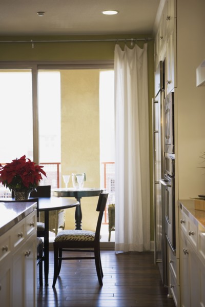 Chair at Dining Room Table with Sliding Glass Door in Background