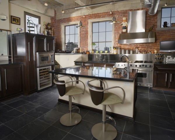 Contemporary kitchen with stainless steel hood.