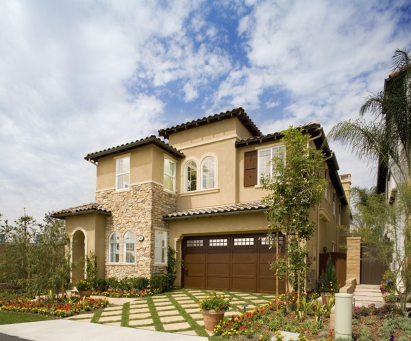 Exterior of a Tuscan Style home in the afternoon