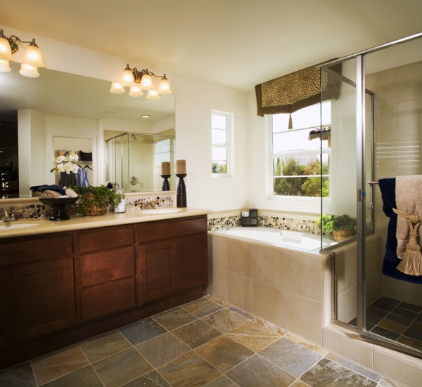 Bathtub in corner of master bath