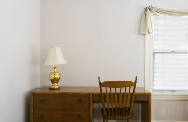 Small desk next to a window
