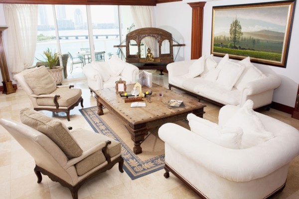 High angle view of sofas and armchairs in ornate living room