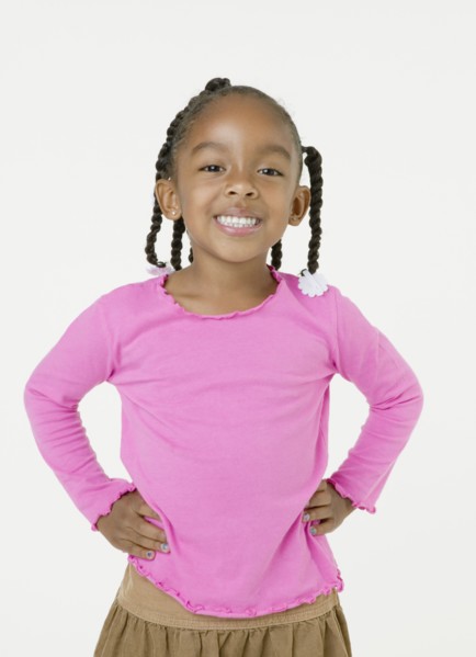 African girl with hands on hips
