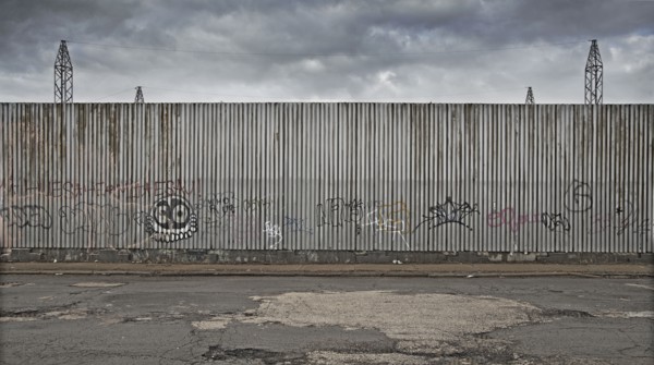 Graffiti on urban metal wall