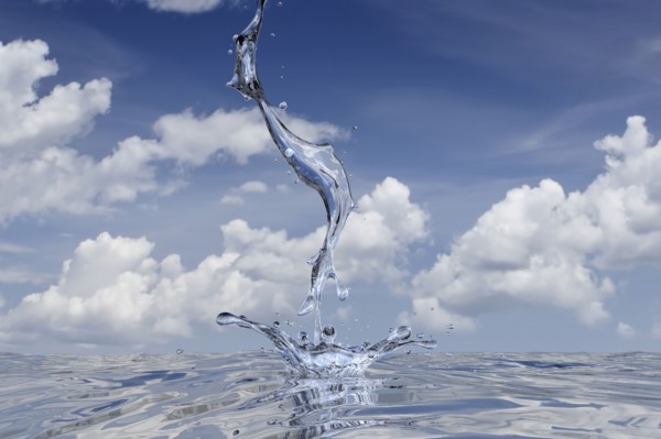 Water stream splashing into pool