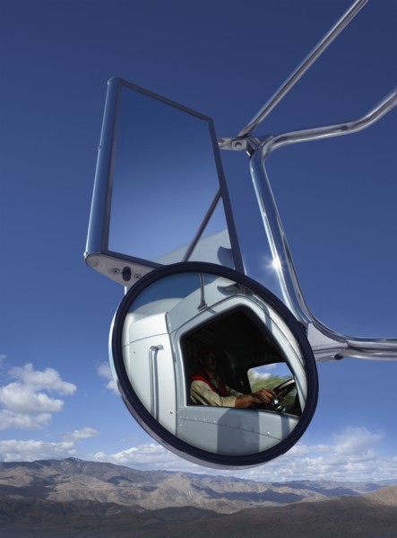Trucker reflected in side mirror