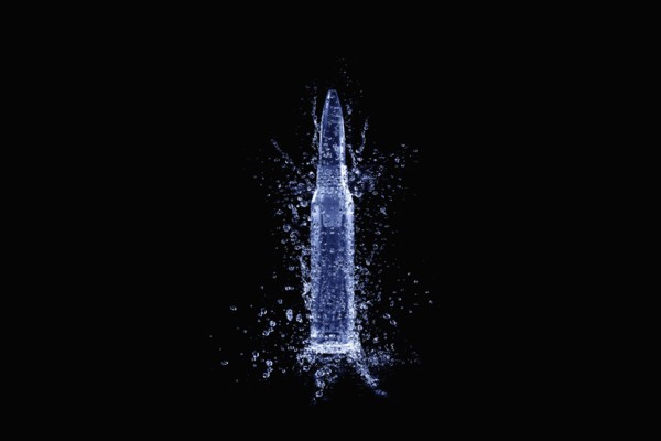 Close up of bullet casing shattering
