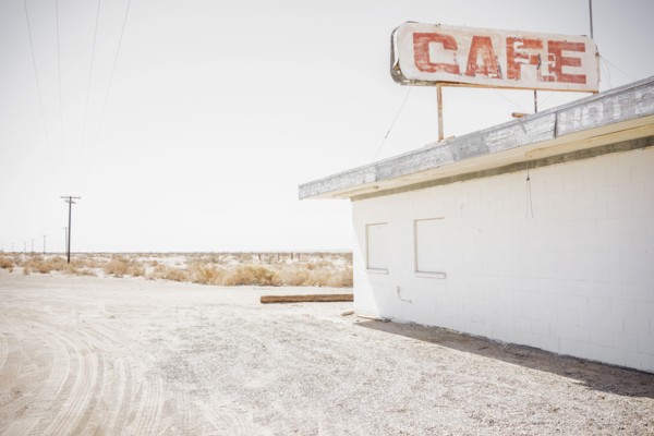 Abandoned cafe on rural dirt road
