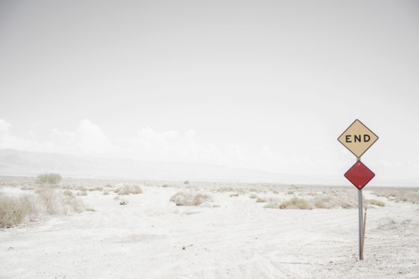 End road sign on remote dirt road