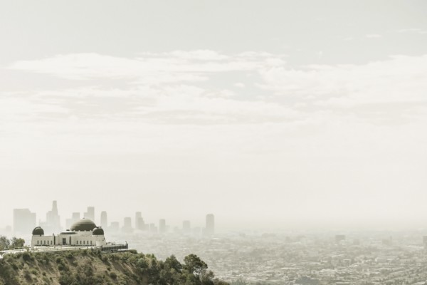 Observatory and city skyline in hazy sky