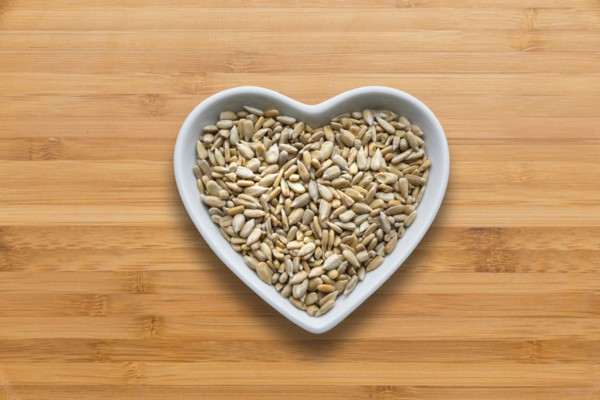 Heart-shaped bowls of heart-healthy seeds
