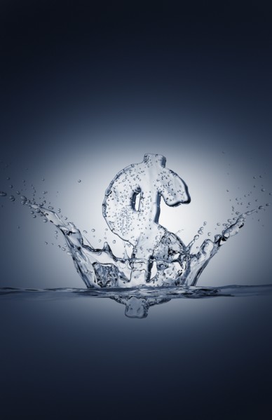 Water droplets splashing from sinking ice dollar symbol