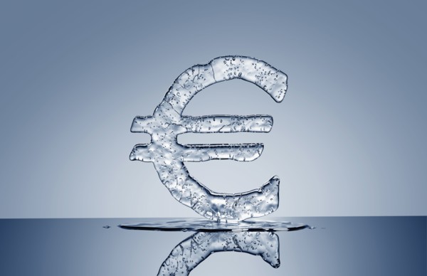 Puddle under melting ice euro symbol