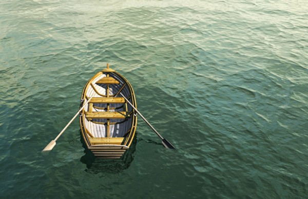 Abandoned rowboat in ocean