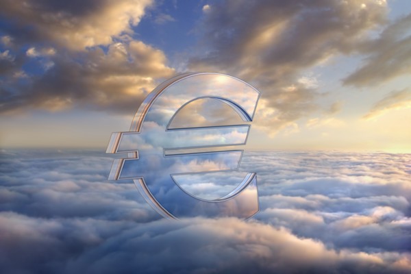 Reflection of clouds in euro symbol in sky