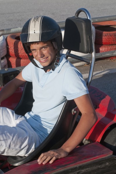 Hispanic teenager on go-cart track