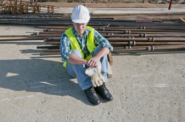 worker taking break in construction site