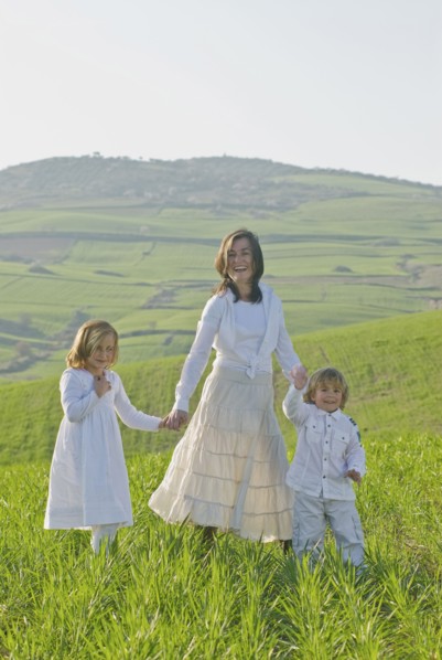 happy family in green fields