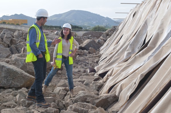male and female engineers in construction site