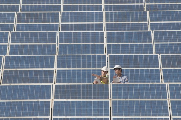 two engineers in solar power plant