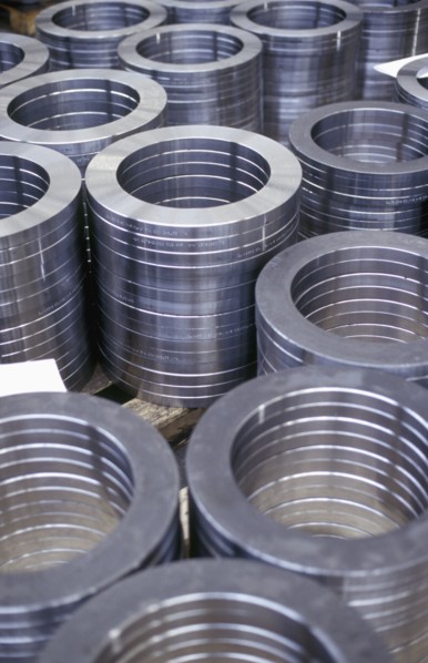 High angle view of stacked metal coils in factory