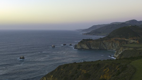 Scenic view of cliffs at ocean