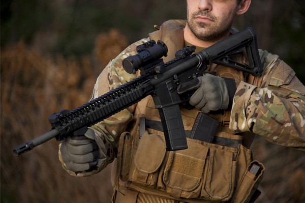 Soldier aiming automatic weapon during training