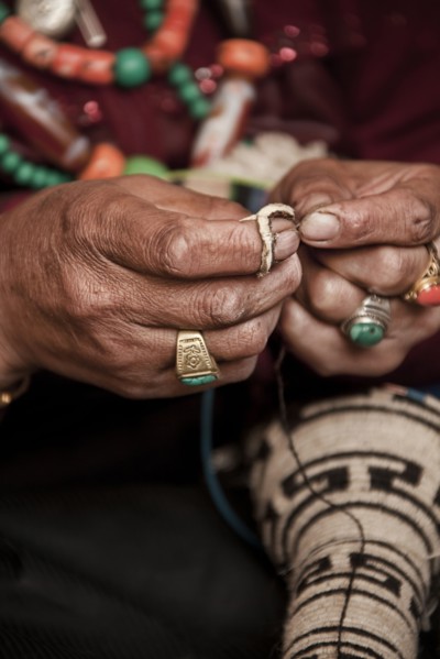 Close up of artist making traditional jewelry