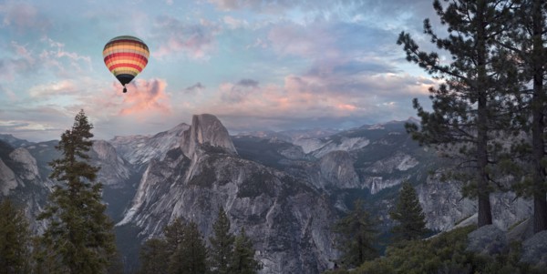 Hot air balloon flying over Yosemite