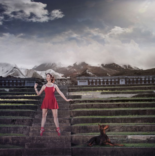 Caucasian ballet dancer balancing on ruins