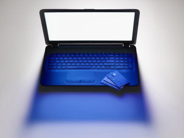 Credit cards on laptop computer