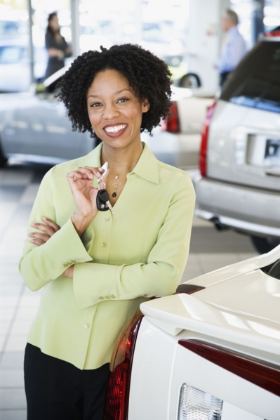 Car saleswoman smiling
