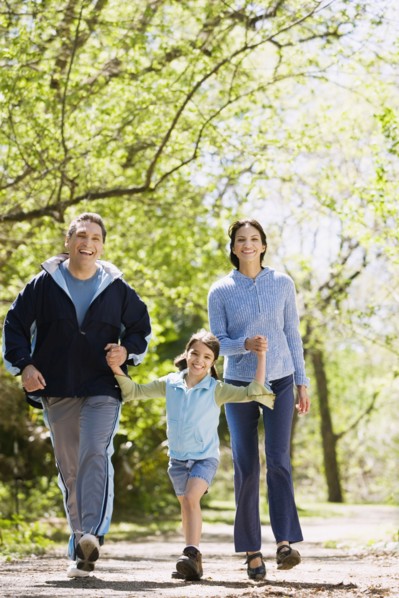 Hispanic family walking outdoors