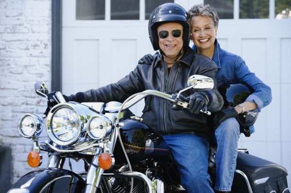Senior African American couple on motorcycle
