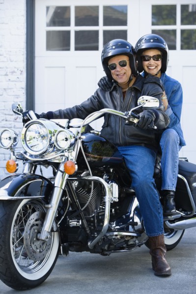 Senior African American couple on motorcycle